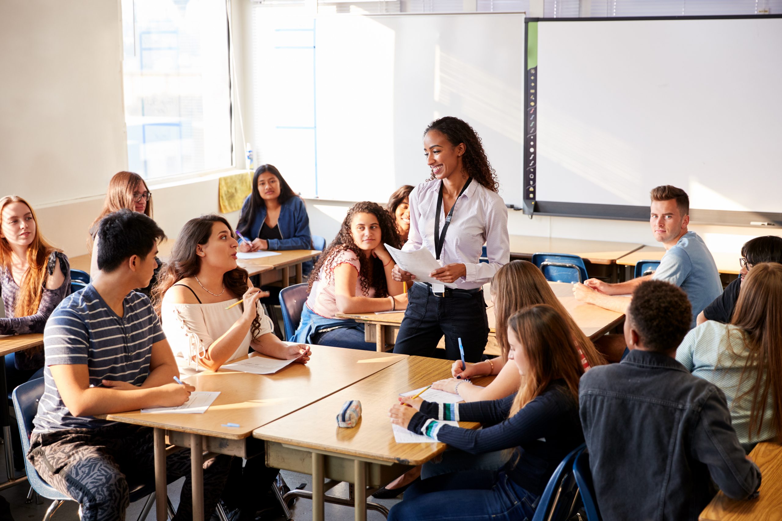 Teacher talking to students